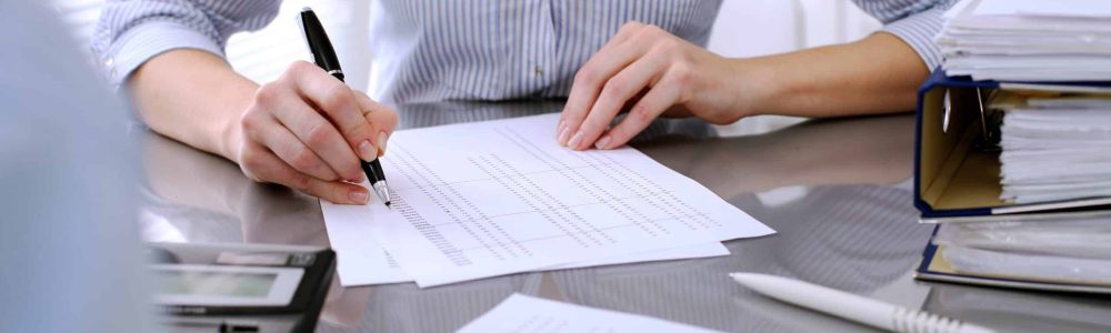 Bookkeepers or financial inspector making report, calculating or checking balance. Audit concept